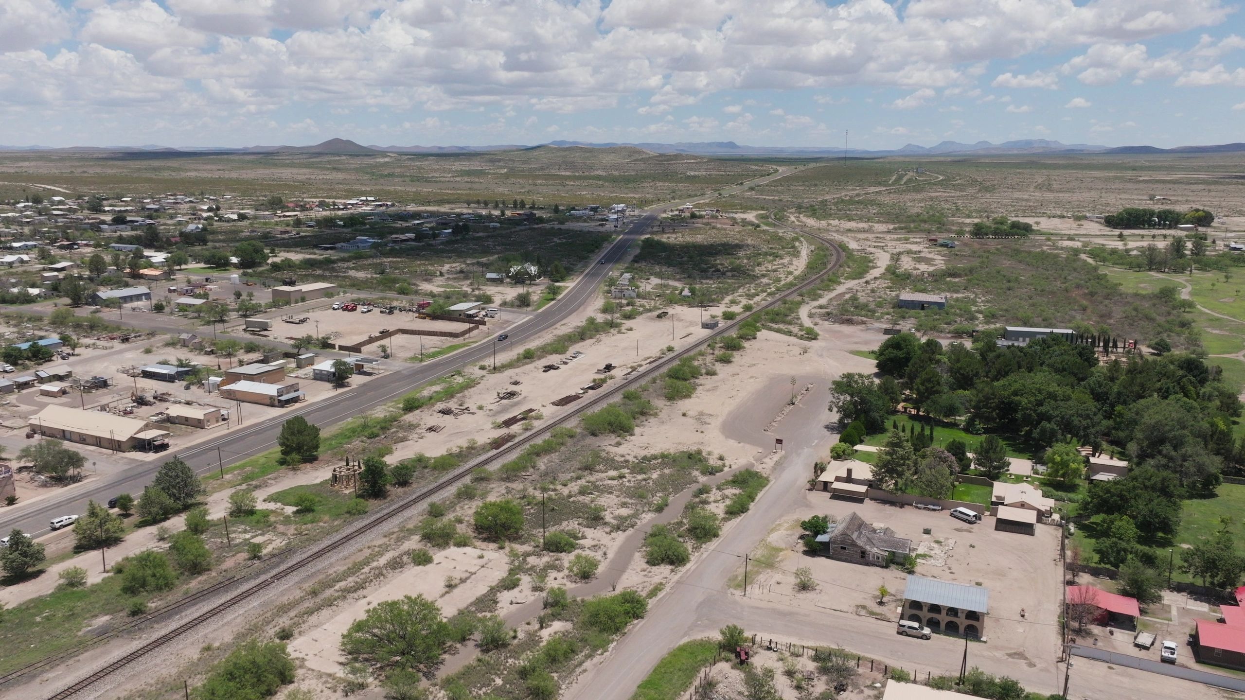Aerial view of open Texas land with roadway access